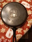 Griswold  #8 Cast Iron Skillet  704 J large logo