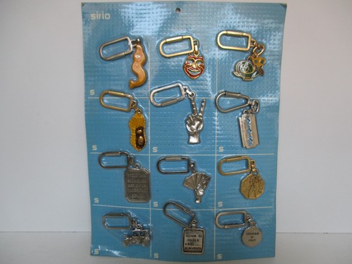 SCONTO 40% PORTACHIAVI METALLO 12 SOGGETTI ANNI '80 - Bild 1 von 2