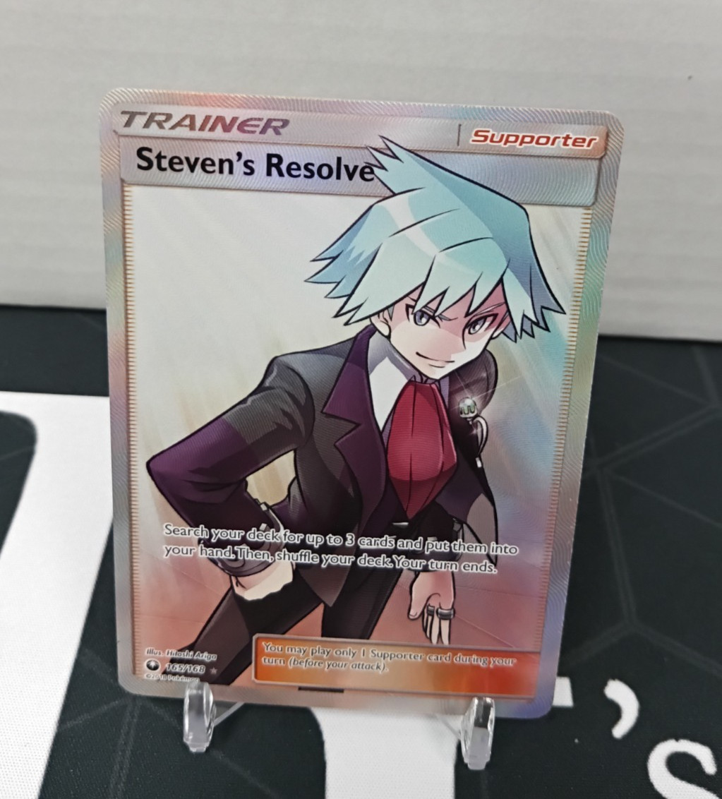 Steven's Resolve (Full Art) 165/168 NM Sun & Moon Celestial Storm Holo Pokemon