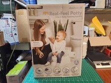 Real Feel 2-in-1 Potty with Wipes Storage Flushing Sounds Disposable Liners Sage