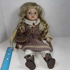 Vintage porcelain head hands and feet sitting Girl Doll With Satchel And Glasses