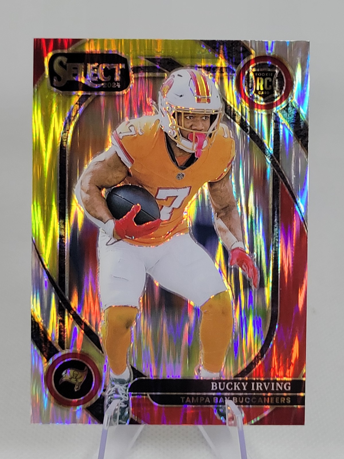 2024 Panini Select - Club Level Bucky Irving #239 Red & Yellow Shock Prizm (RC)