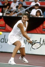 Monica Seles of Yugoslavia hits a return at a women's singles matc- Old Photo 7