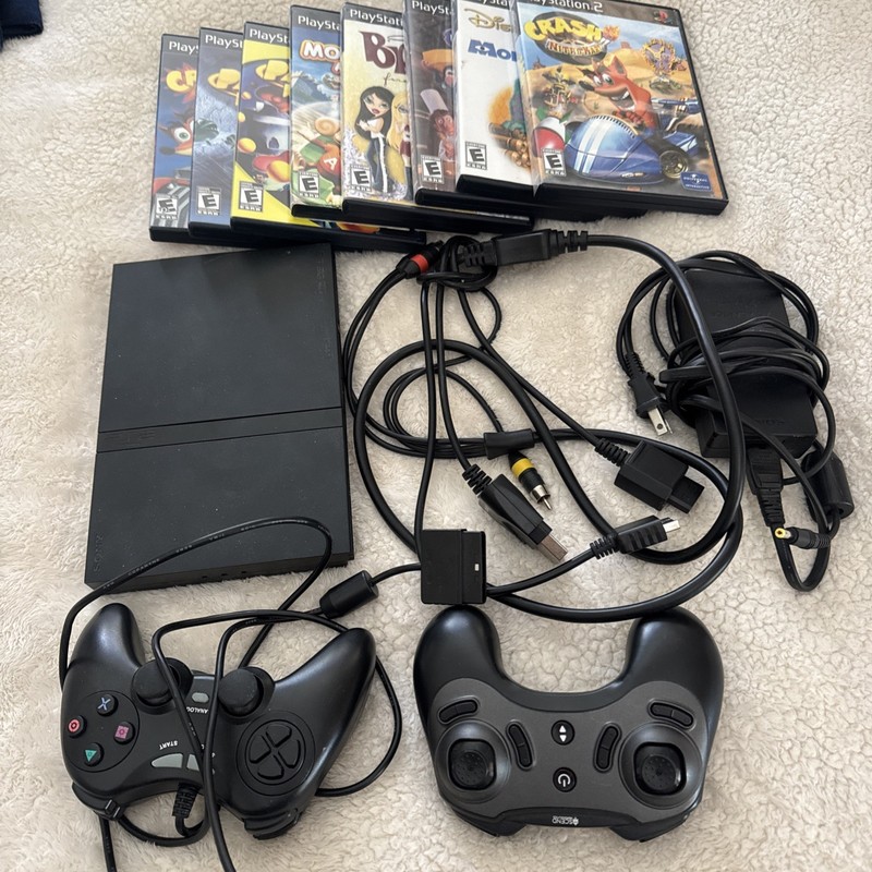 Sony PS2 with SCOH-70012 Serial FS3821100 With 2 Remote and 8 Games
