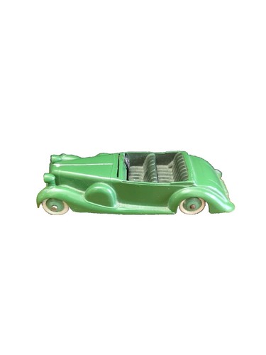 1950's Dinky #157 JAGUAR XK-120 dark green w/ cream hubs diecast