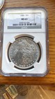 1886 $1 Morgan Silver Dollar NGC MS63  White Mirror Fields — photo 1