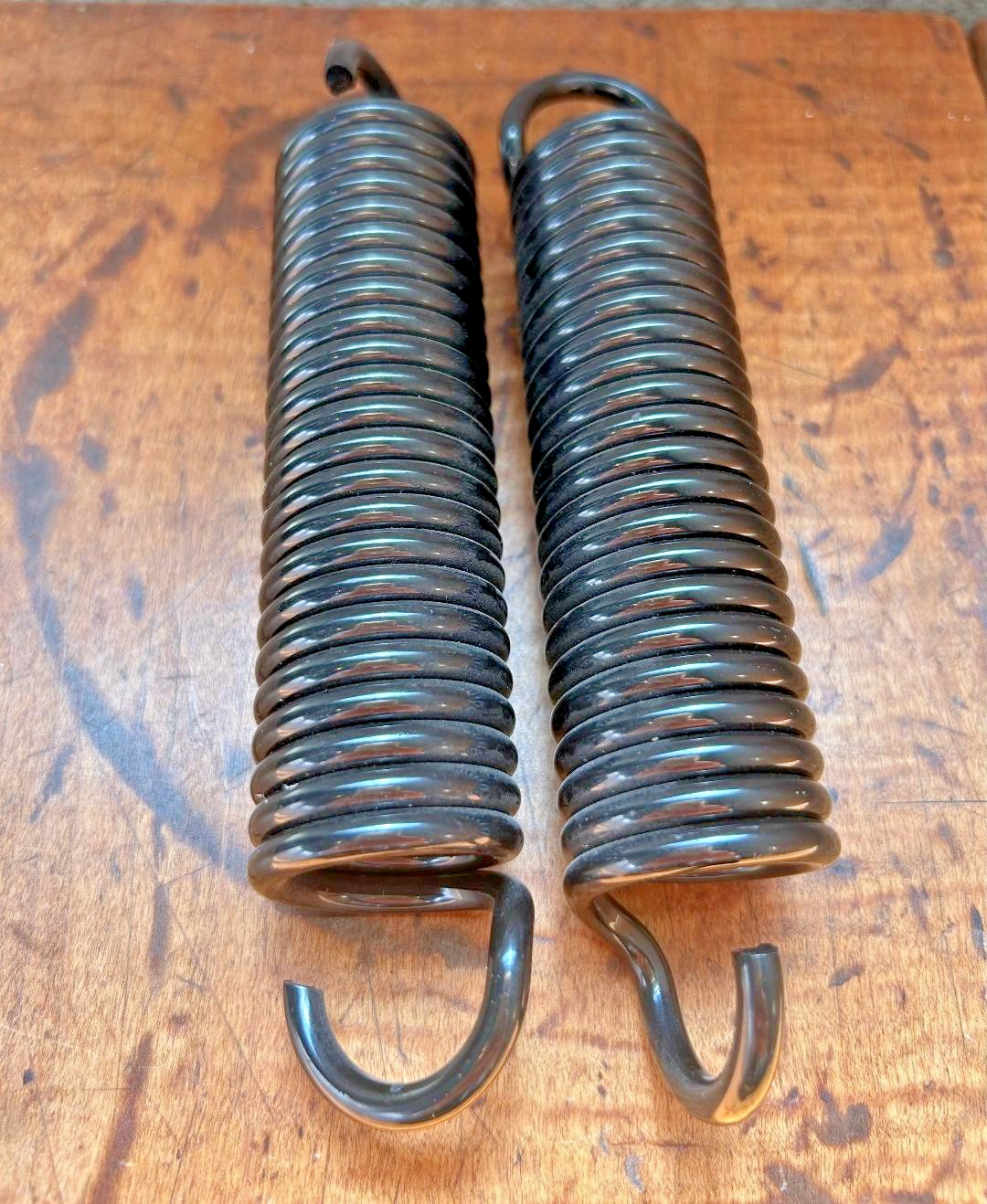 57 Chevy Hood Hinge Springs Pair NEW 1957 Chevrolet