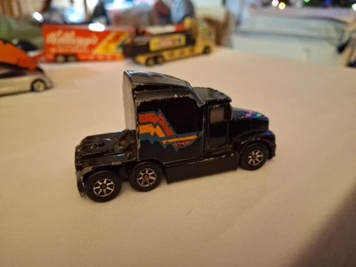 Vintage 1986 Hot Wheels Black Semi Truck With MP Logo