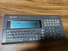 SHARP PC-G801 Pocket Computer with Instructio...