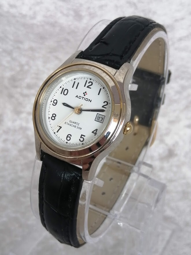 Montre femme vintage Action en cuir noir et quartz des années 1980