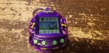 Giga Pet Digital Doggie Purple Eggplant Tiger Electronics Working 1997 New Batte