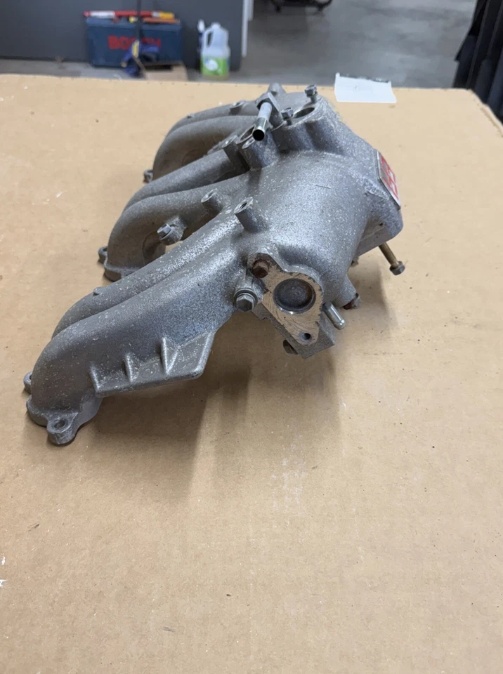 Colector de admisión Toyota Land Cruiser OEM 3FE FJ 60 FJ62 FJ 80. Foto 3 de 4