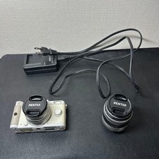 PENTAX Q mirrorless camera with 2 lenses