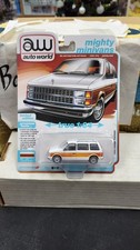 NIB 2024 1985 DODGE CARAVAN WOODY VAN MIGHTY MINIVANS AUTO WORLD 1/64 R2 4A