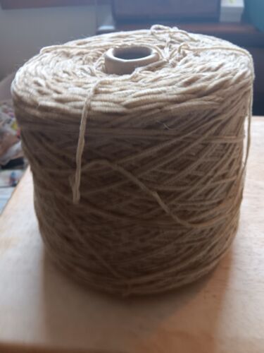 1lb 7oz Cone Of Tan Colored Yarn. 8.5" Round 7"Tall. #3 Light Weight Yarn