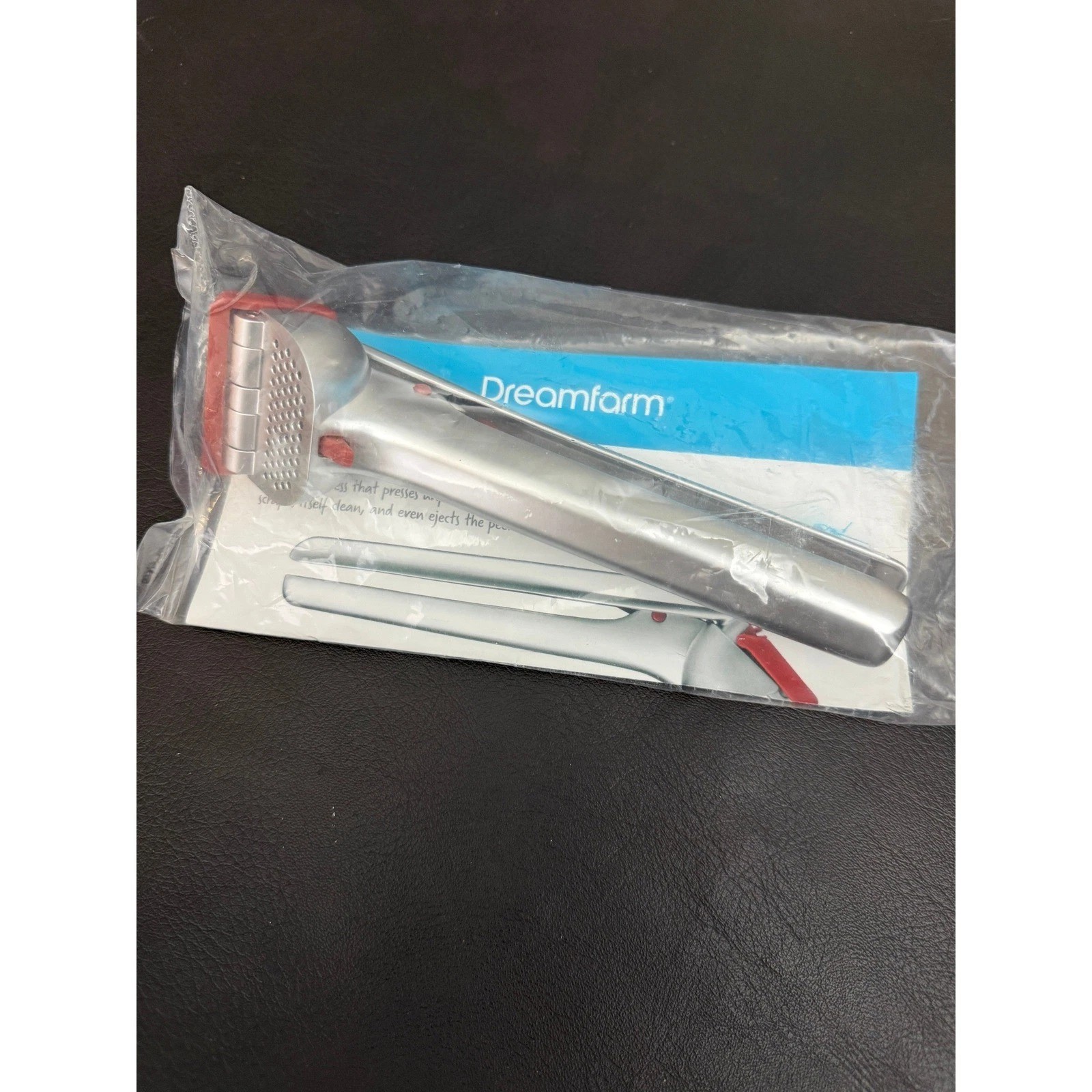 Dreamfarm Garject Garlic Press Silver Red Self Cleaning Scraper Peel Ejector
Opens in a new window o