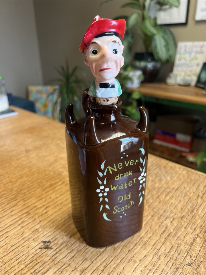 A figural ceramic scotsman decanter from Lipper & Mann Japan — a kitschy, characterful barware piece with real vintage personality.