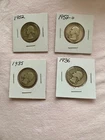 four silver washington quarters  1935 1936 1952 1952 d