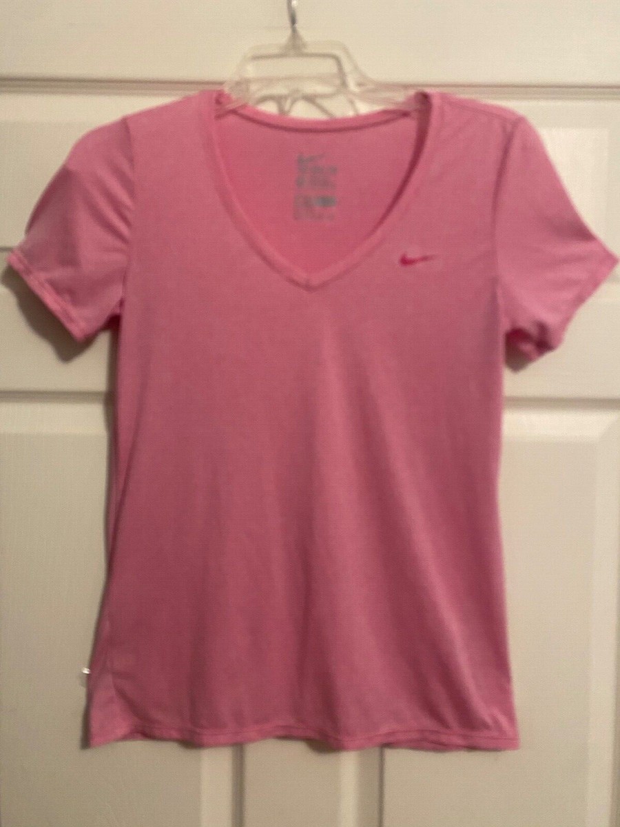 light pink and white nike shirt