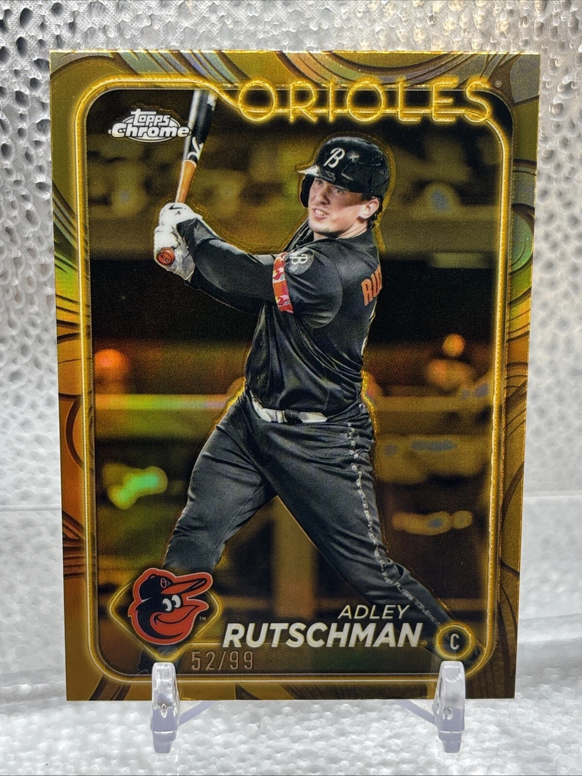 2024 Topps Gilded Adley Rutschman Gold Refractor /99 Orioles SP
