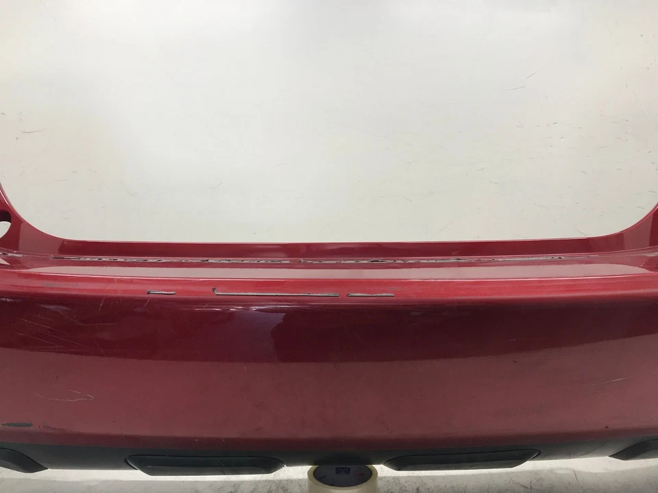 Cubierta de parachoques trasero roja 08-13 Nissan Rogue Select 14 15 SL SV S 85022-JM04H OEM Foto 3 de 4