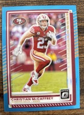 2025 Panini Donruss Optic NFL Christian McCaffrey Neon Blue Prizm #140/399 49ers