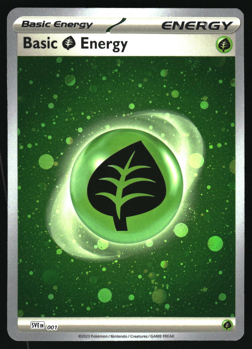 Pokemon Basic Grass Energy (Cosmos Holo) SVE: Scarlet & Violet Energies 001 NM