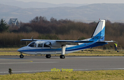 Foto 6x4 G-HEBO kommt am Flughafen Oban an BN Islander ehemals G-BUBK jetzt c2013