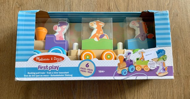 melissa and doug rocking farm animals pull train