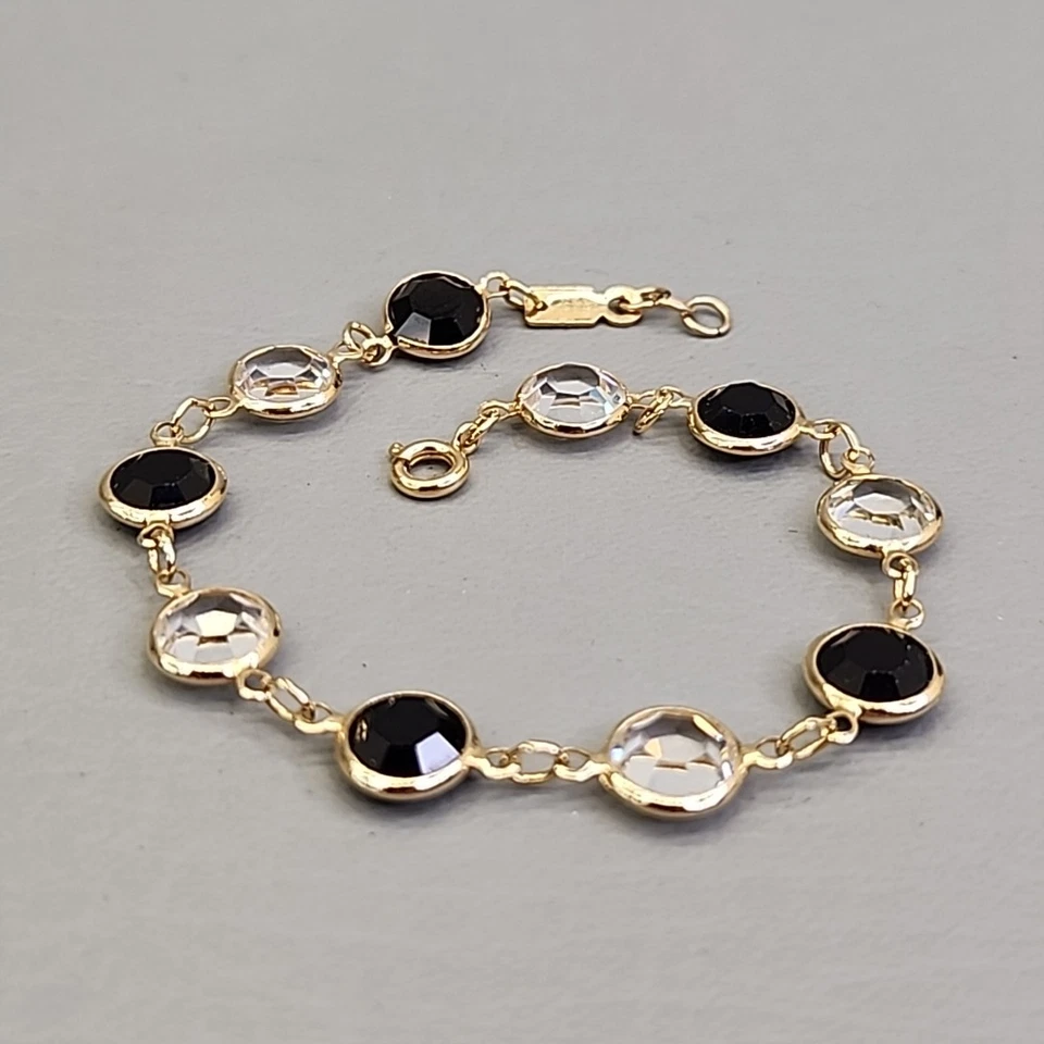 Pulsera con cuentas vinculada bisel abierto vidrio negro claro tono dorado 7,25" Foto 4 de 4