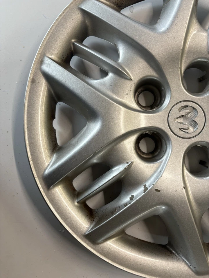 Cubierta de rueda tapacubos Dodge Caravan 2001-2005 15" OEM. 04766971AA Foto 4 de 4