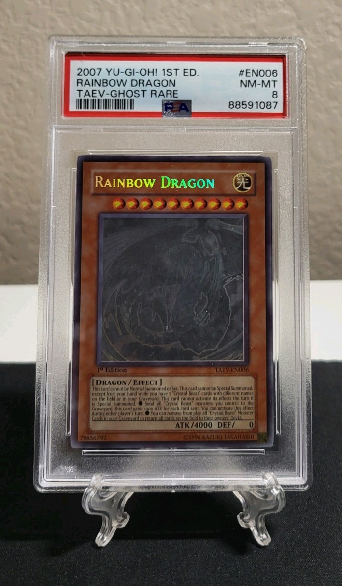 Yugioh 2007 Rainbow Dragon TAEV-EN006 1st Edition Ghost Rare PSA 8 (Clean Foil) view 1