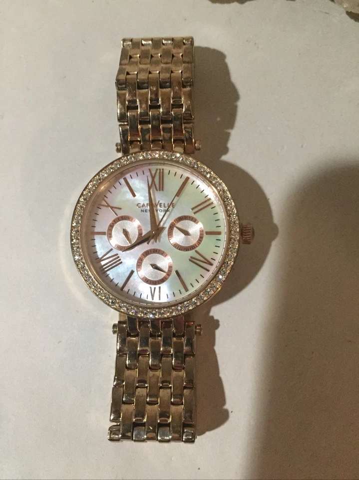 Reloj para Hombres Caravelle New York Oro Rosa Estrás Bling Con Batería Nueva Foto 3 de 4