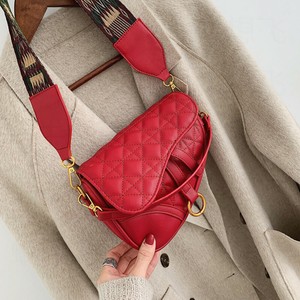 handbag with wide shoulder strap