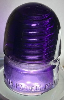 CD 143 F Canadian Pacific Ry Co SB Deep Purple Insulator 1 1/4” Chip On Base