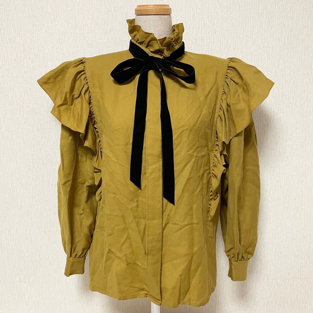 Autentica blusa Yves Saint Laurent con volant a nastro vintage lana gialla taglia S