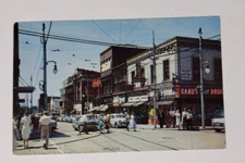 Busy Corner at Wilkinsburg PA Lincoln Hwy Penn and Wood UNP Postcard Rexall Cars