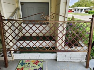King Size Iron head board with criss cross pattern used in good shape. Pick up