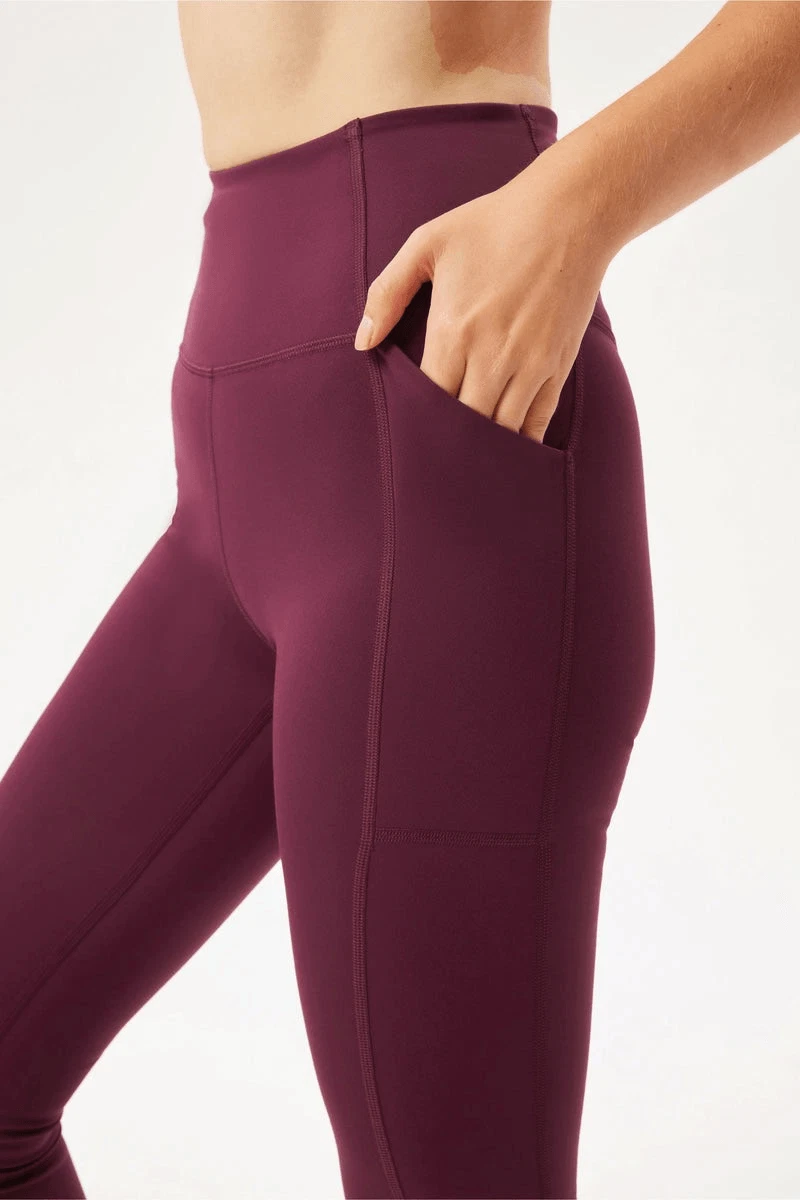 girlfriend-collective plum compressive pocket leggings