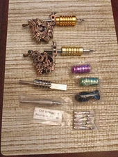 Two Professional Tattoo Machines with Extra Grips & Accessories