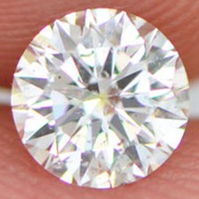 0.43 Carat Round Cut Diamond White F Color SI1 Natural Enhanced Loose Certified