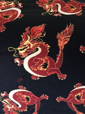 Dragon print material black Orange White Yellow Flames Timeless Treasures