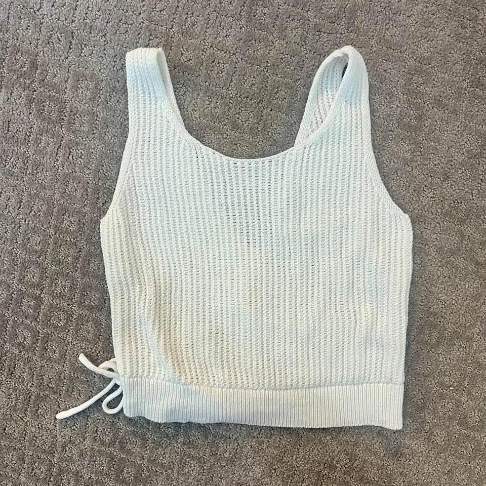 Camiseta sin mangas de punto de algodón acanalado con corbata cruzada blanca Vince usada en excelente estado talla pequeña Foto 2 de 4