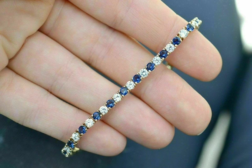 Brazalete de tenis de diamantes y zafiros creados en laboratorio redondo de 4 quilates enchapado en oro de 14 quilates Foto 2 de 4