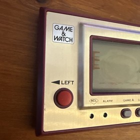 NINTENDO GAME & WATCH  HELMET  GOLD BOXED WITH MANUAL 1981 Working