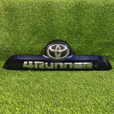 Toyota 4Runner 2010-2024 OEM Rear Tail Lift Gate Garnish Handle Panel Emblem