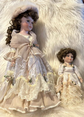 2 Porcelain Dolls. 18  & 10   Dressed Almost Identical. Beautiful Clothing &Hair