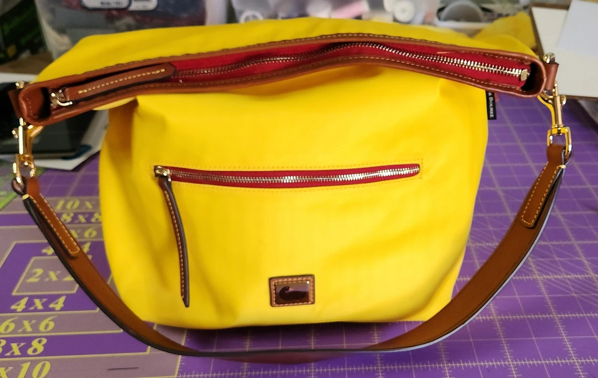 Dooney & Bourke Nylon Exterior Yellow Bags & Handbags for Women