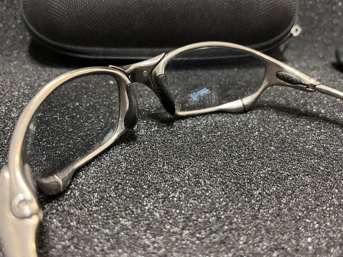 Oakley Juliet Polished/Titanium Clear Polarized Lens Double X with