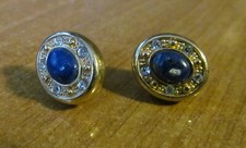 Orecchini in metallo dorato e pietra blu